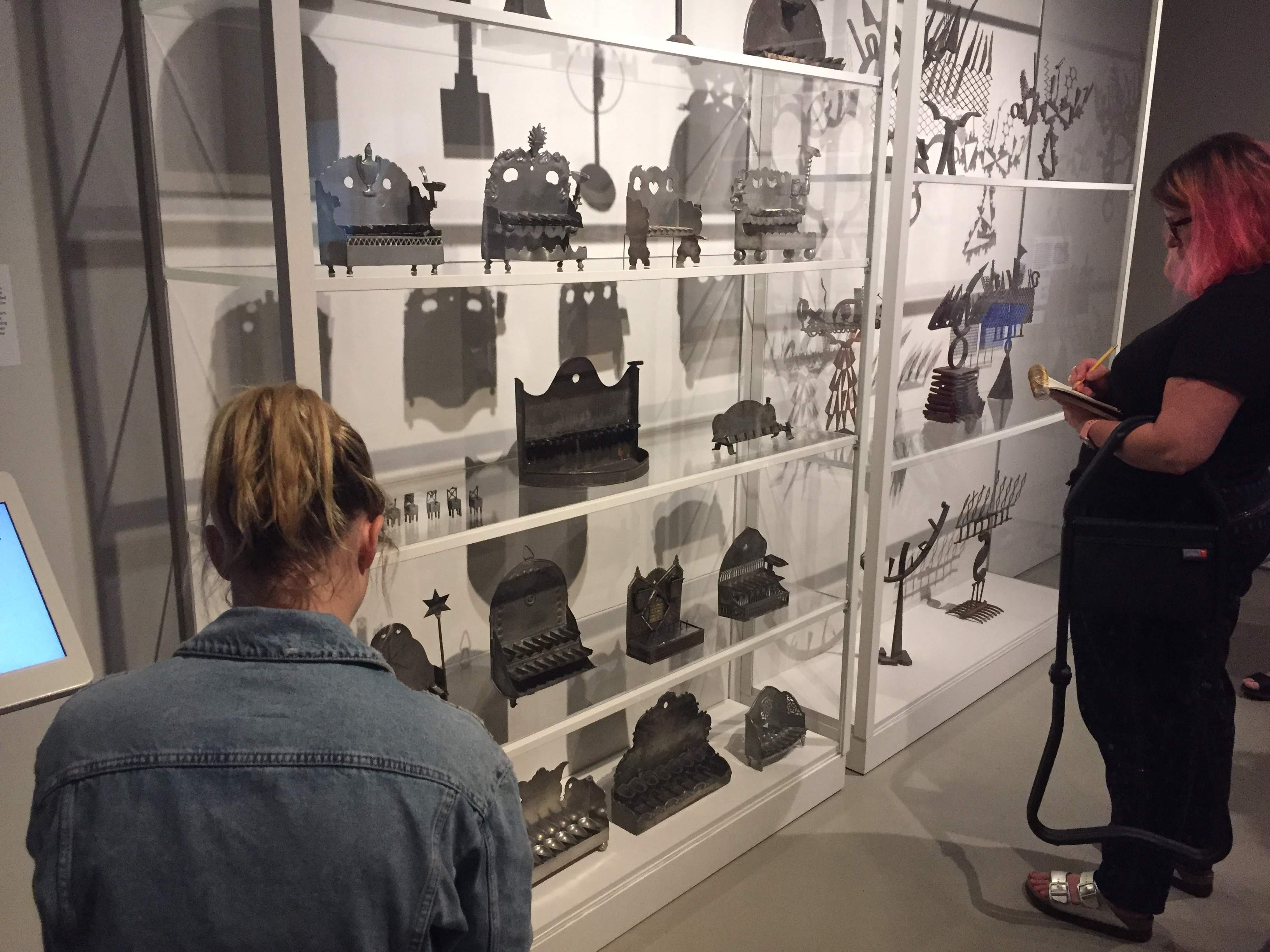 Educators drawing Hanukkiot at The Jewish Museum