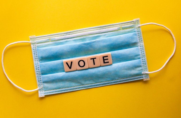 Early Childhood Civic Education Picture A mask with blocks that spell out vote