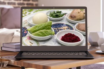 Seder plate on a laptop screen