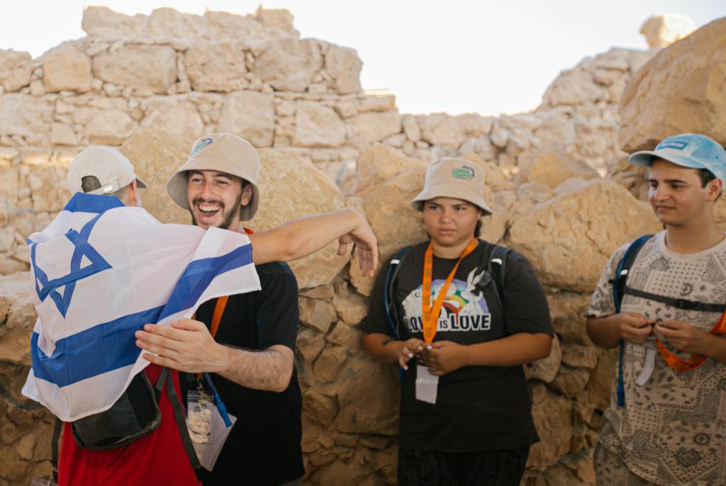 teen boys hugging on masada