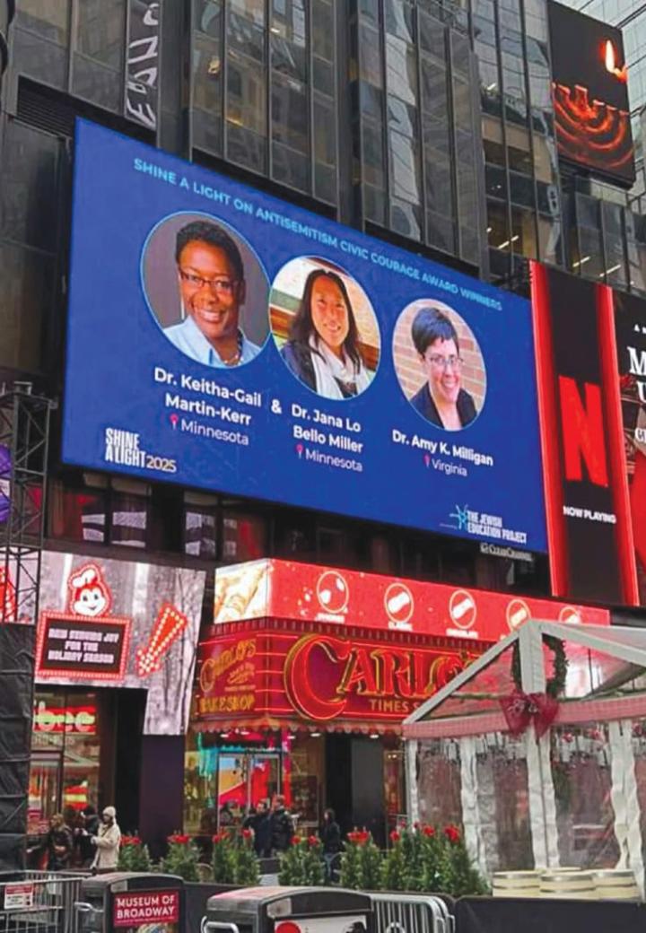 A billboard in Times Square shows three of the Shine a Light Honorees