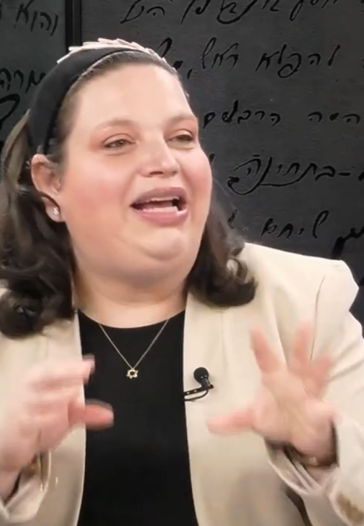 Rabba Yaffa in mid-sentence with a black background with text