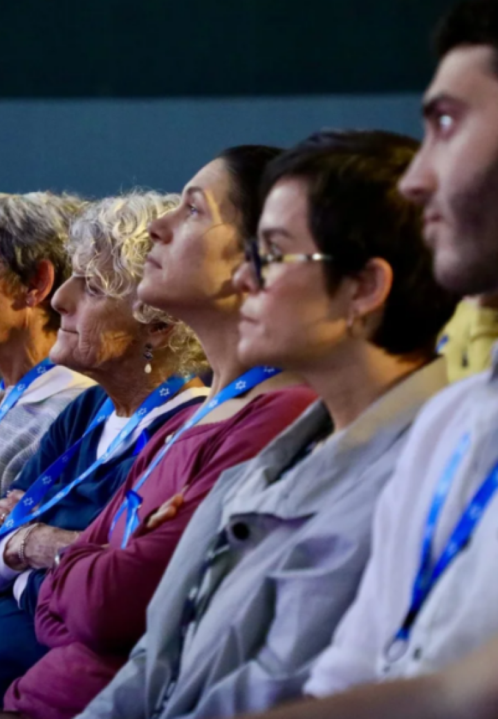 a crowd of educators looks up