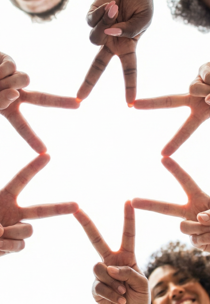 Adults form a Star of David with their fingers