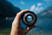 Picture of a camera lens and mountain